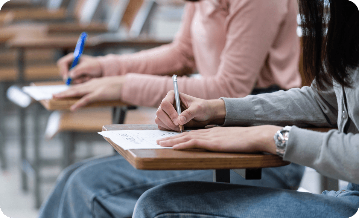 NEXT Exam - Medical student studying and writing exam